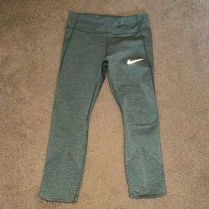 Nike Women's Teal Green Athletic Leggings with Reflective Swoosh